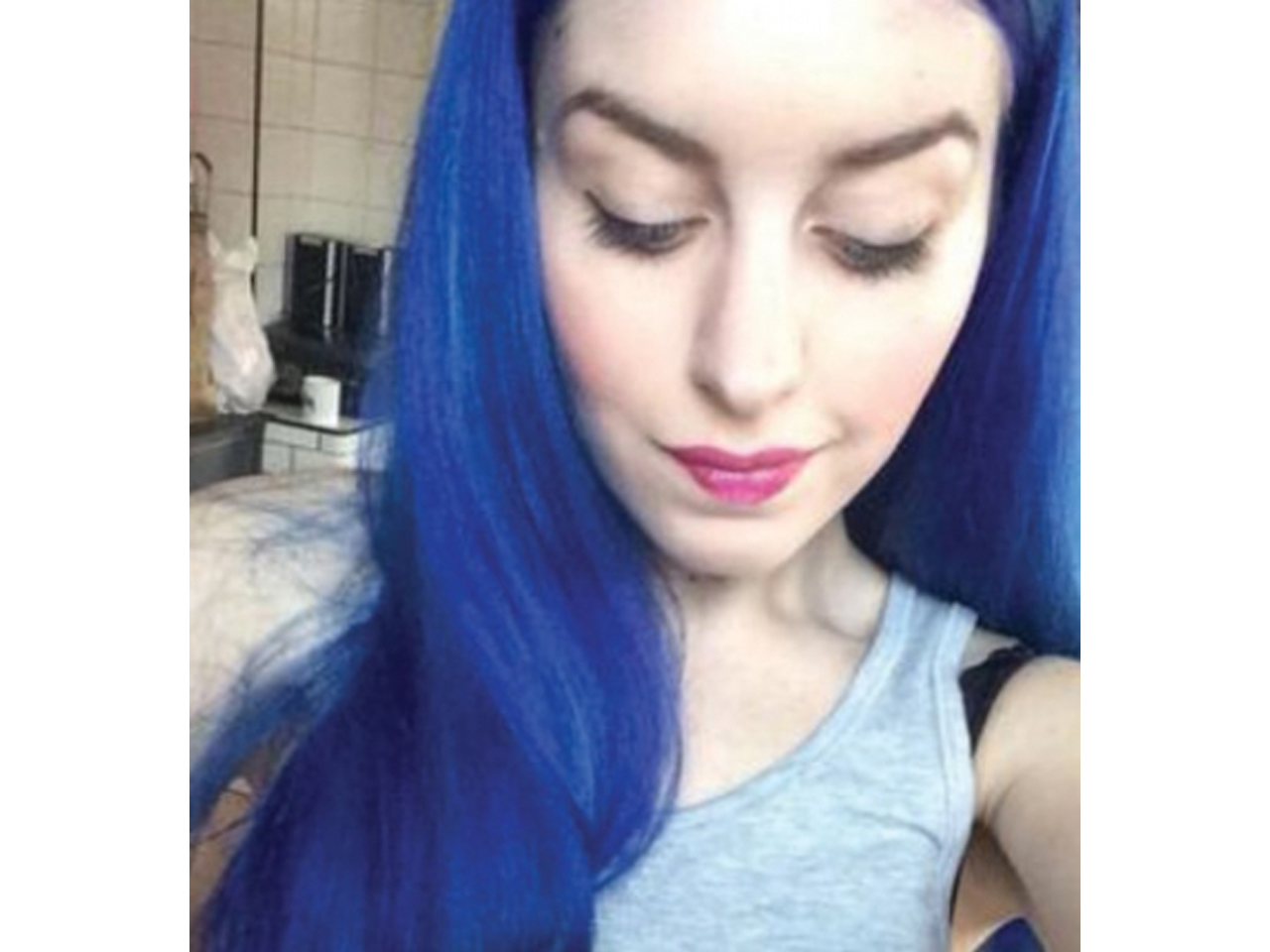 neon blue hair tan skin